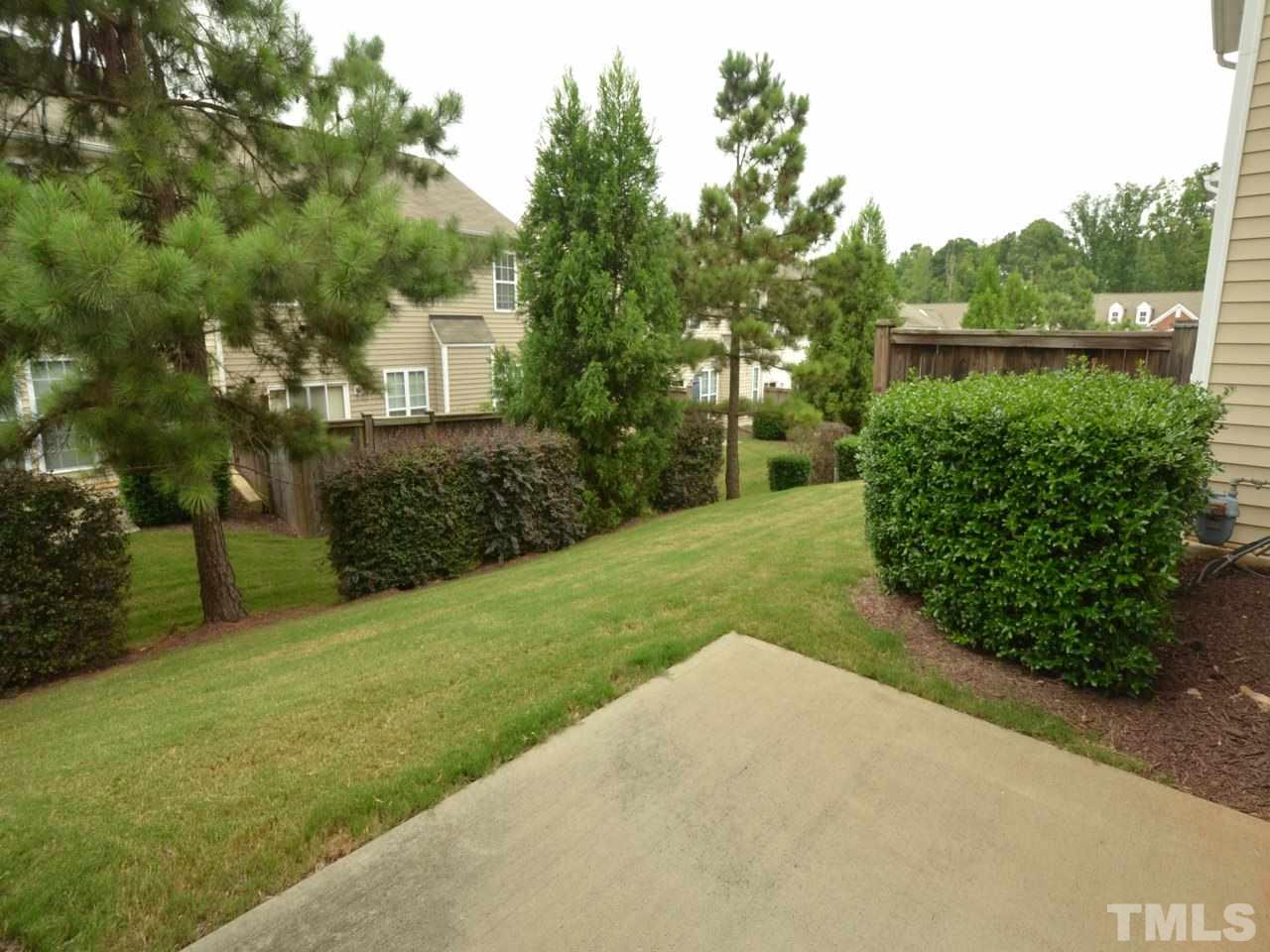 8709 Owl Roost Place Raleigh, NC 27617 - Photo 18 of 25 Established landscaping creates a sumptuous view of trees, flora and occasionally fauna.