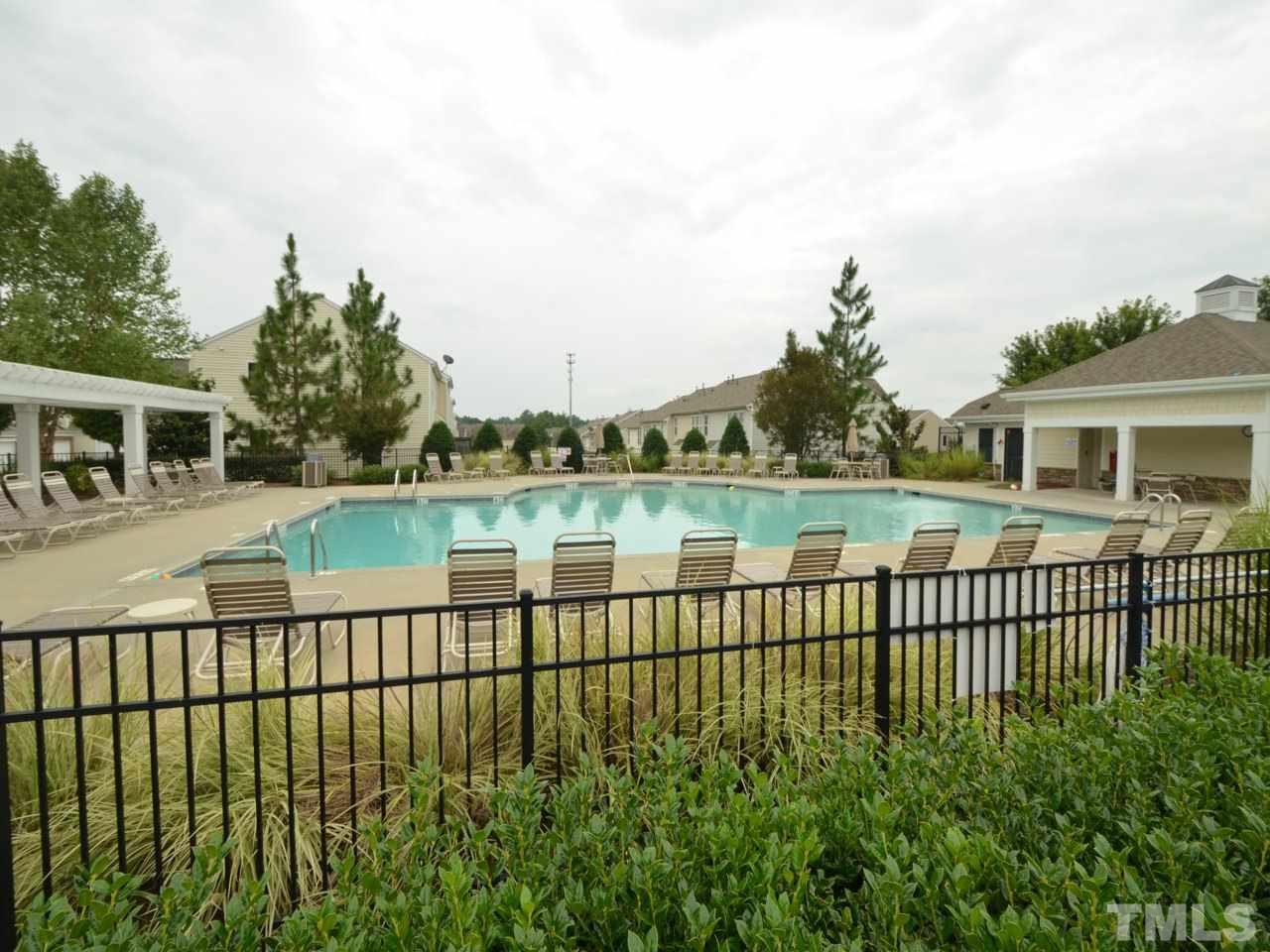 8709 Owl Roost Place Raleigh, NC 27617 - Photo 21 of 25 Lounge chairs, arbor, pool house are all included.