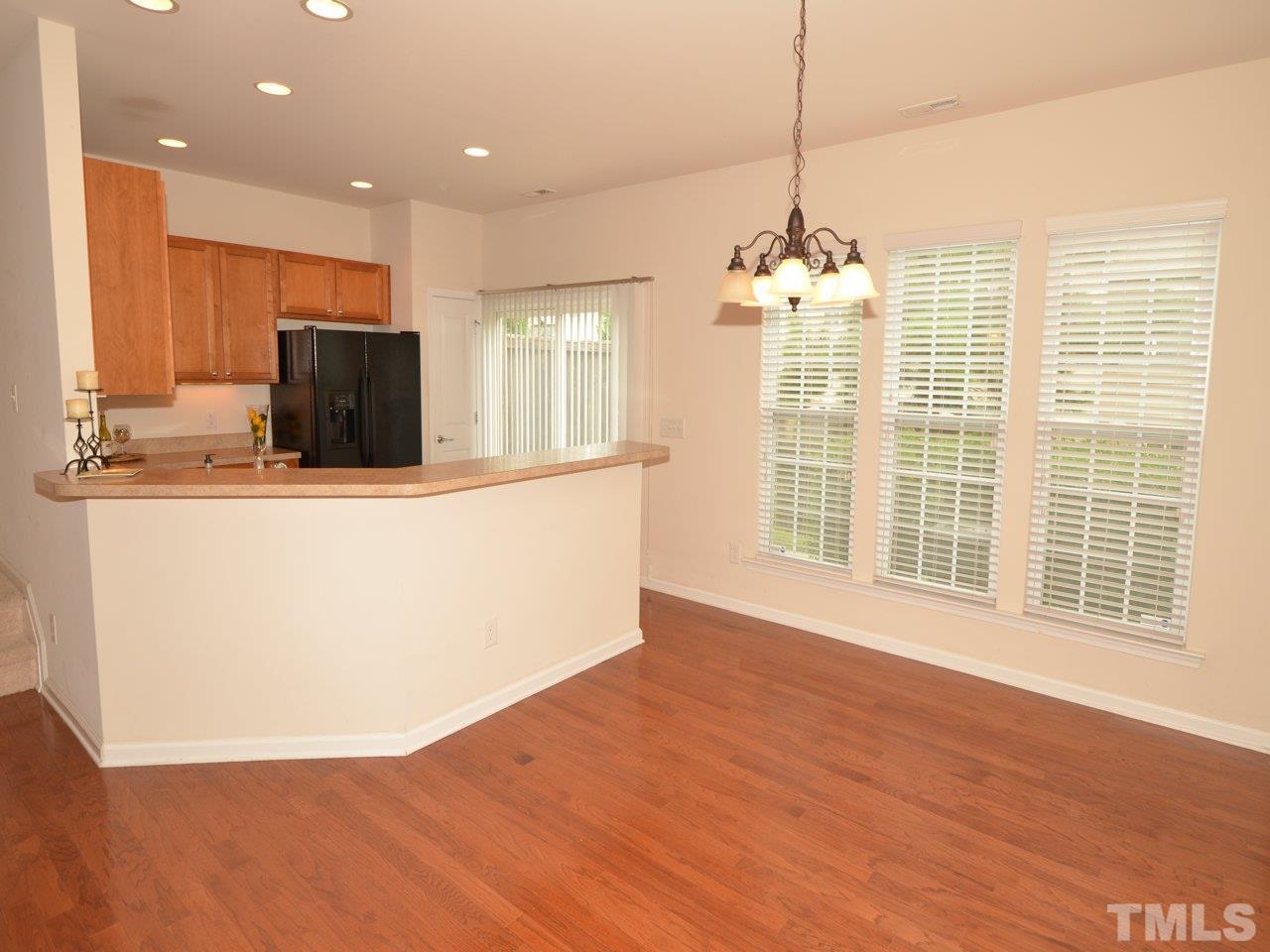 8709 Owl Roost Place Raleigh, NC 27617 - Photo 4 of 25 Love all the details w/ the extended breakfast bar & under counter lighting. So pretty. This is the ideal space for setting out drinks & nibblies plus when it’s time to pull up a stool, an endless variety of breakfast bar stools will look fabulous here.
