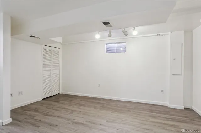 a view of a refrigerator in kitchen