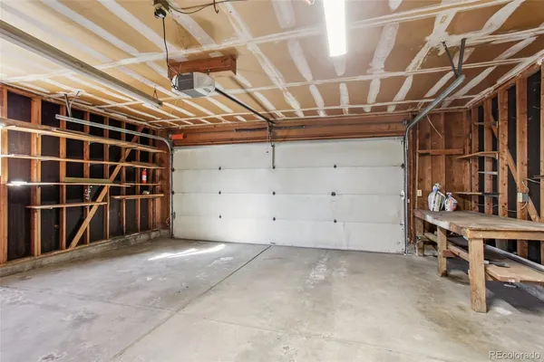 a view of a room with wooden walls