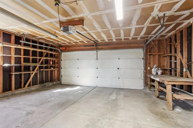a view of a room with wooden walls