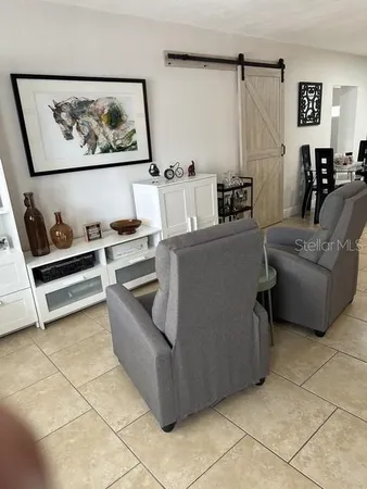 a living room with furniture and a couch