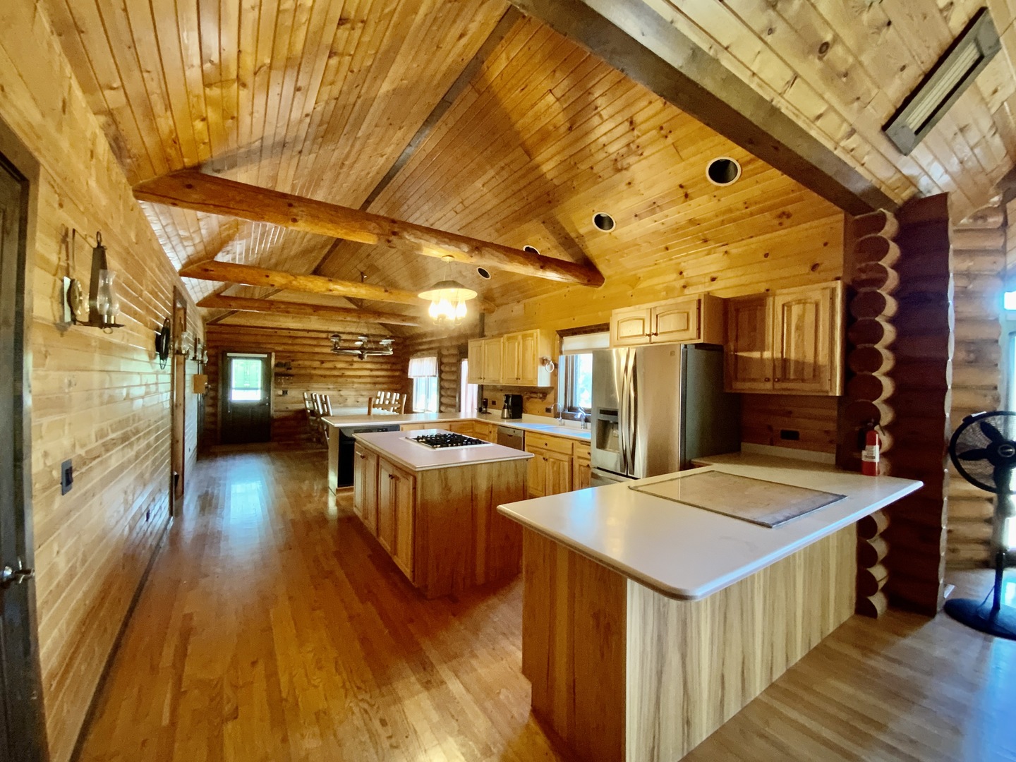 1988 North 3189th Road Ottawa, IL 61350 - Photo 11 of 33 a view of a kitchen with a sink and dishwasher with wooden floor