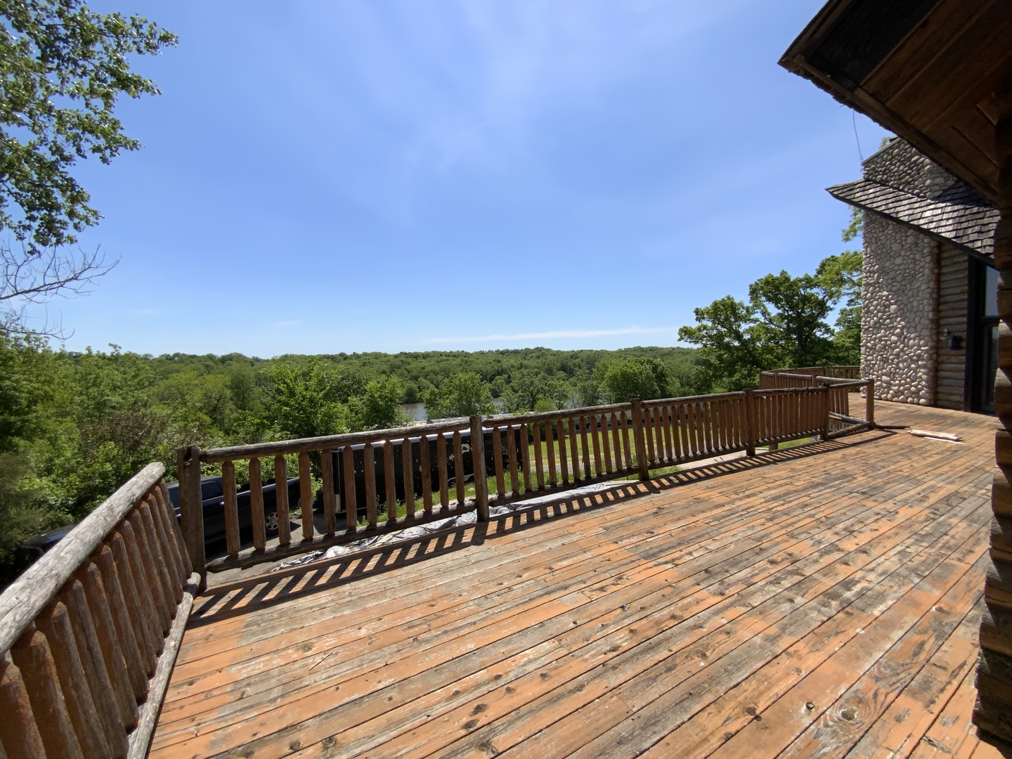 1988 North 3189th Road Ottawa, IL 61350 - Photo 2 of 33 a balcony with wooden floor and fence