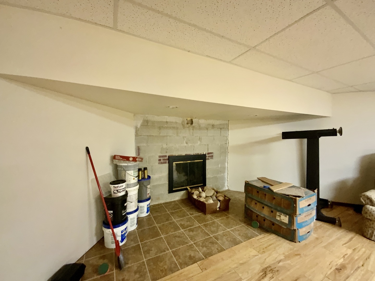 1988 North 3189th Road Ottawa, IL 61350 - Photo 23 of 33 a living room with furniture a fireplace and a flat screen tv