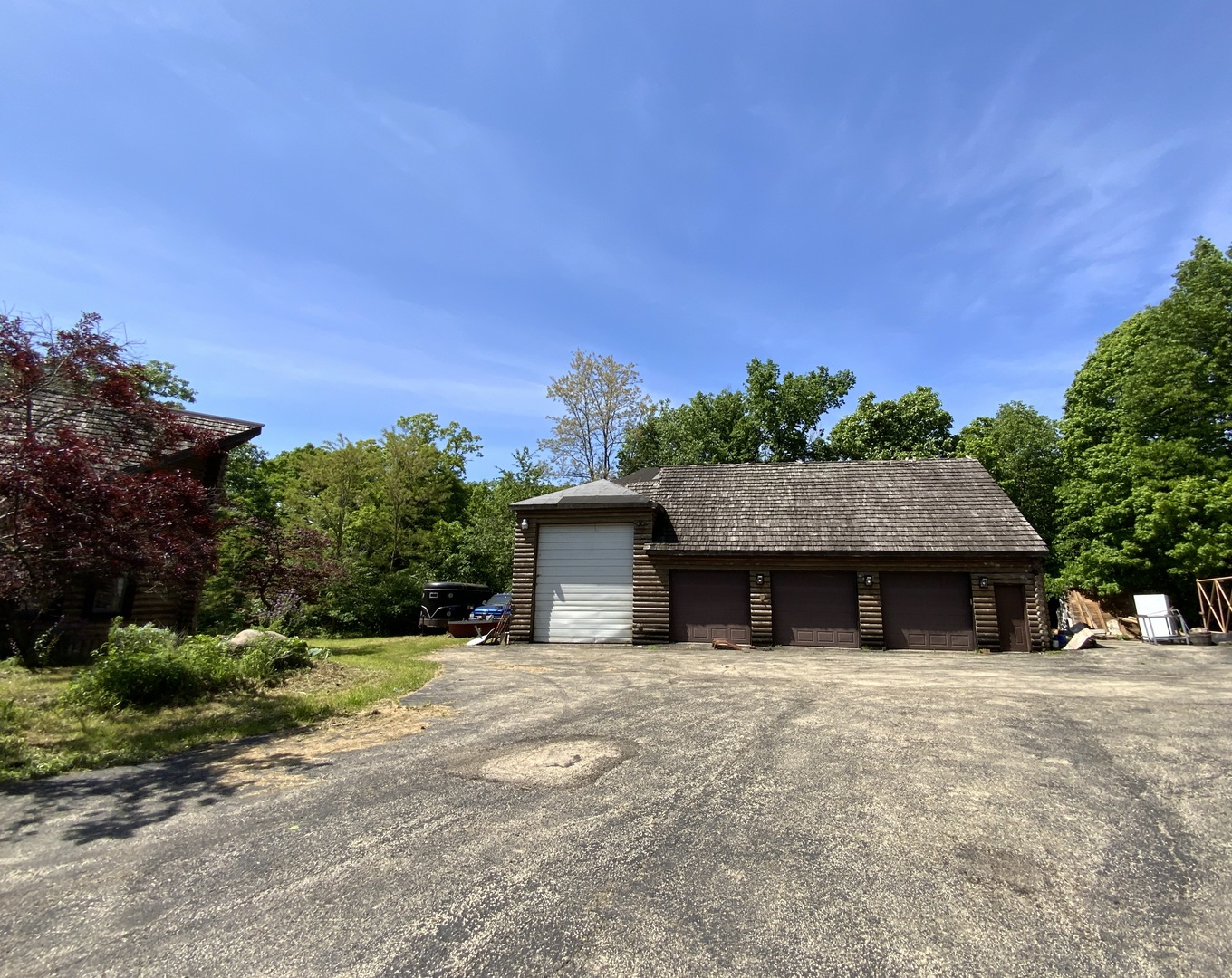 1988 North 3189th Road Ottawa, IL 61350 - Photo 5 of 33 a front view of a house with a yard and garage