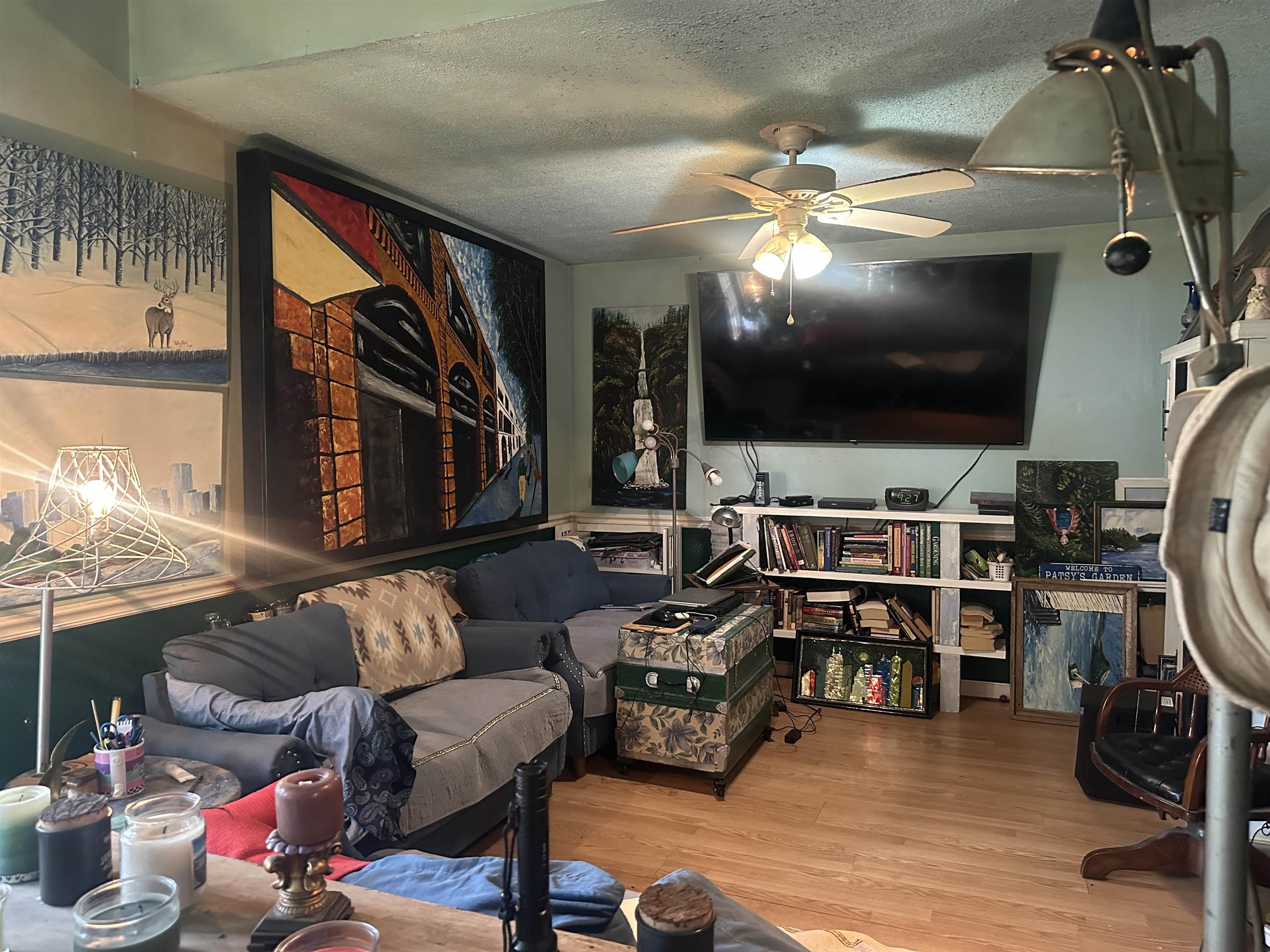 5865 Enville Road Henderson, TN 38340 - Photo 14 of 24 a living room with furniture and a flat screen tv