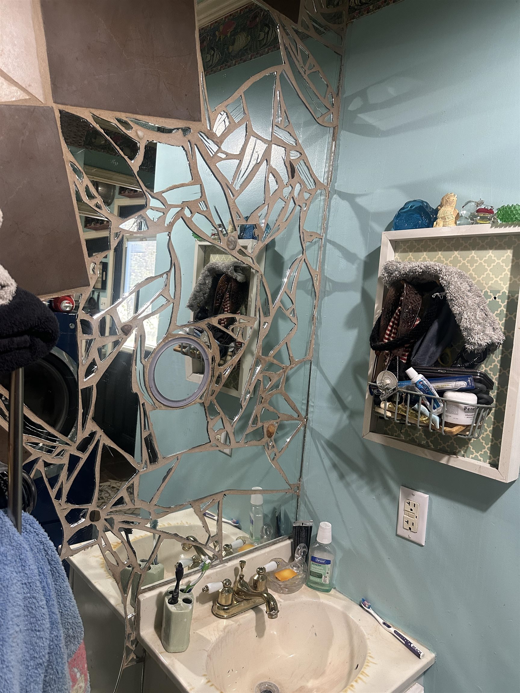 5865 Enville Road Henderson, TN 38340 - Photo 21 of 24 a bathroom with a sink and mirror