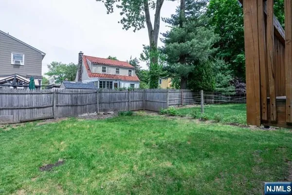a view of a backyard with a garden