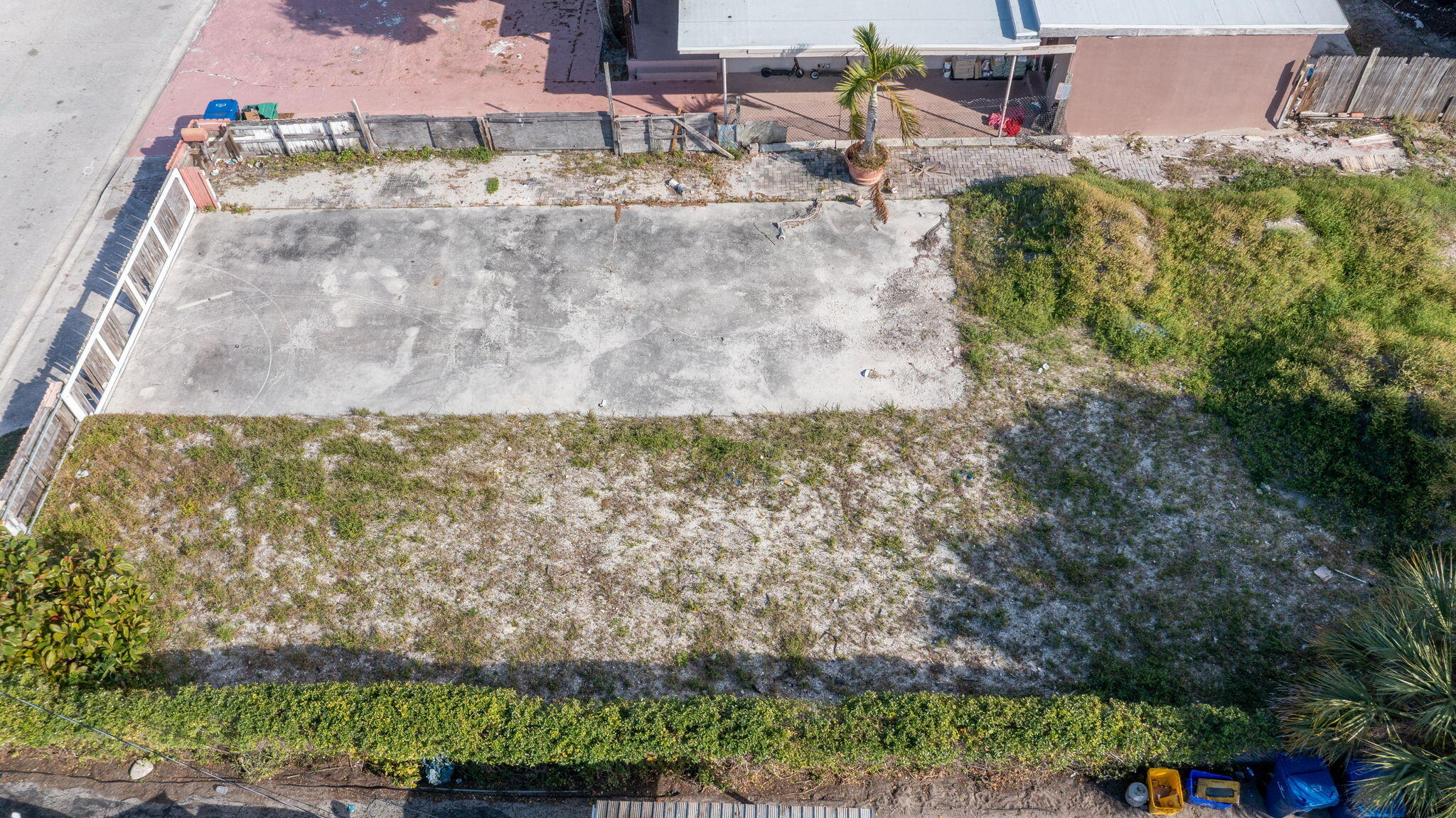 1045 West 30th Street Riviera Beach, FL 33404 - Photo 4 of 5 an aerial view of a house with a yard