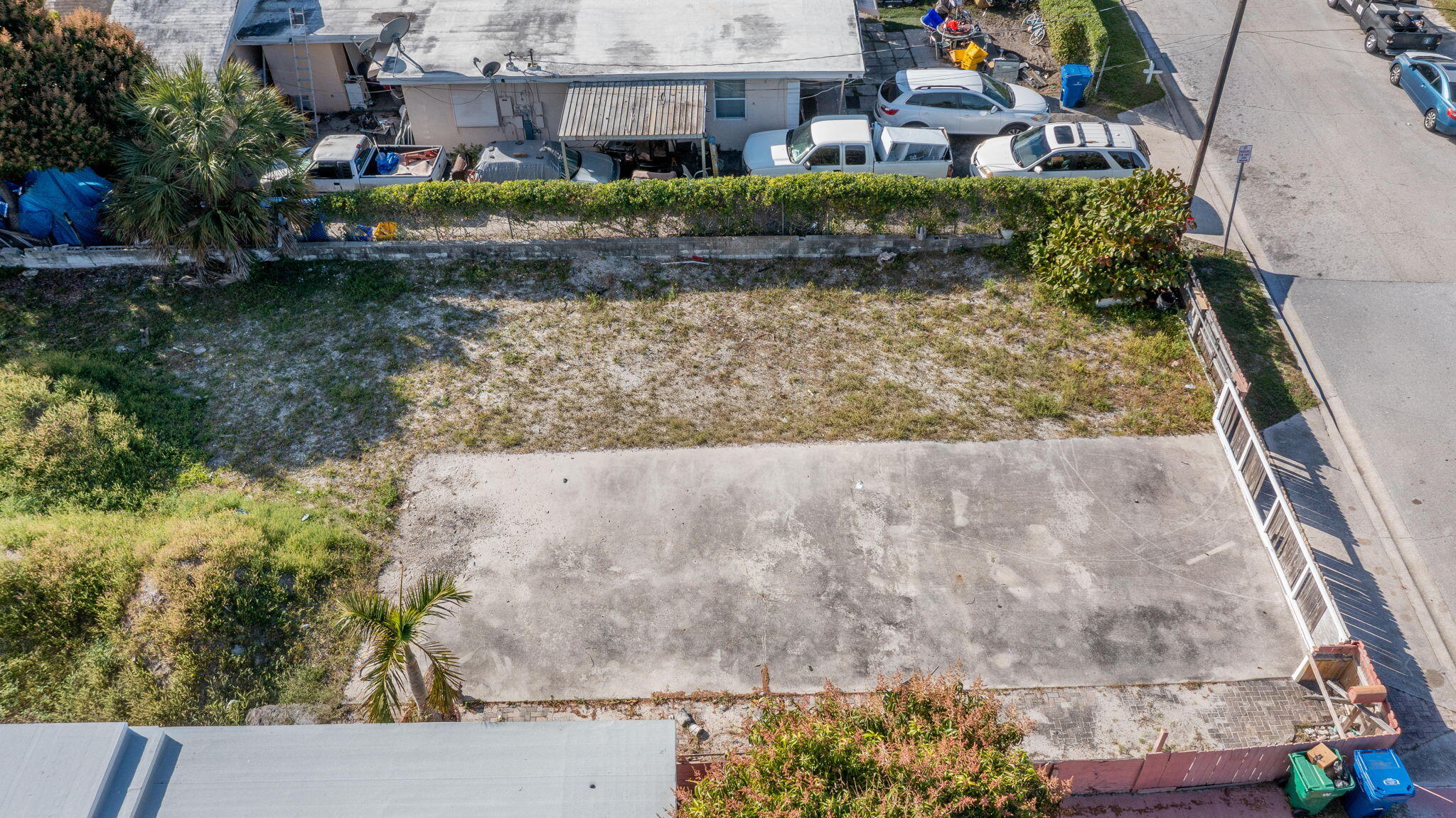 1045 West 30th Street Riviera Beach, FL 33404 - Photo 5 of 5 front view of a house with a yard