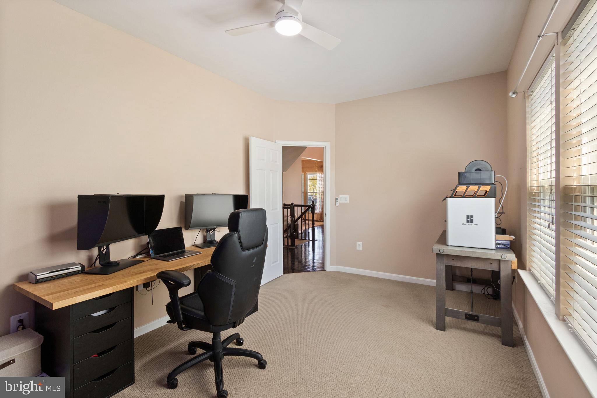 18 Dewitt Road Stafford, VA 22554 - Photo 17 of 73 a view of a workspace with furniture and a window