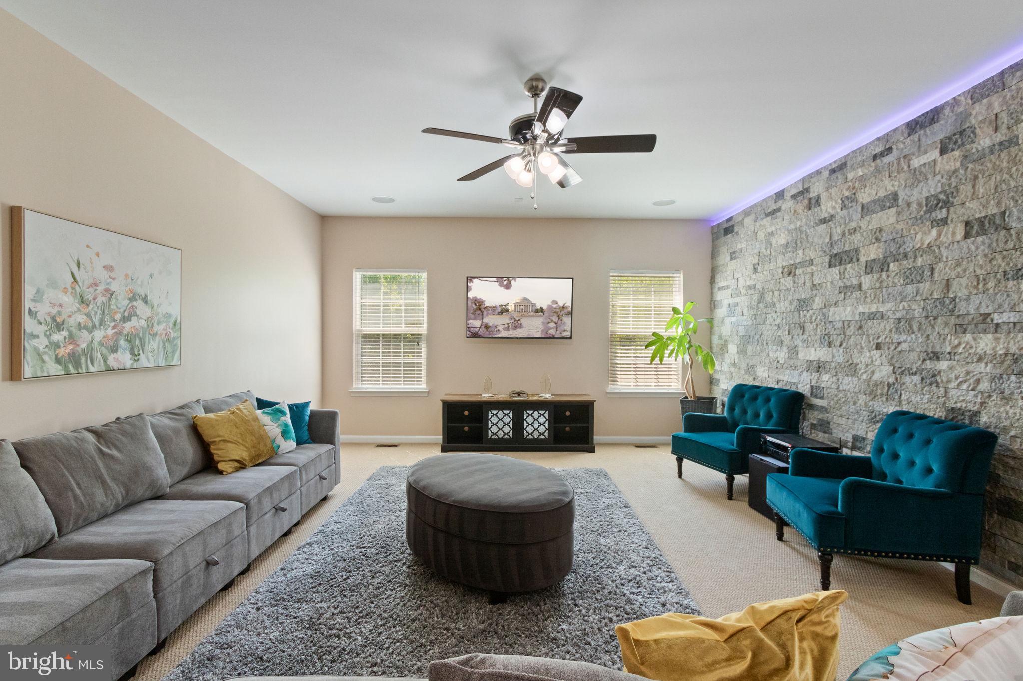 18 Dewitt Road Stafford, VA 22554 - Photo 19 of 73 a living room with furniture and a fireplace