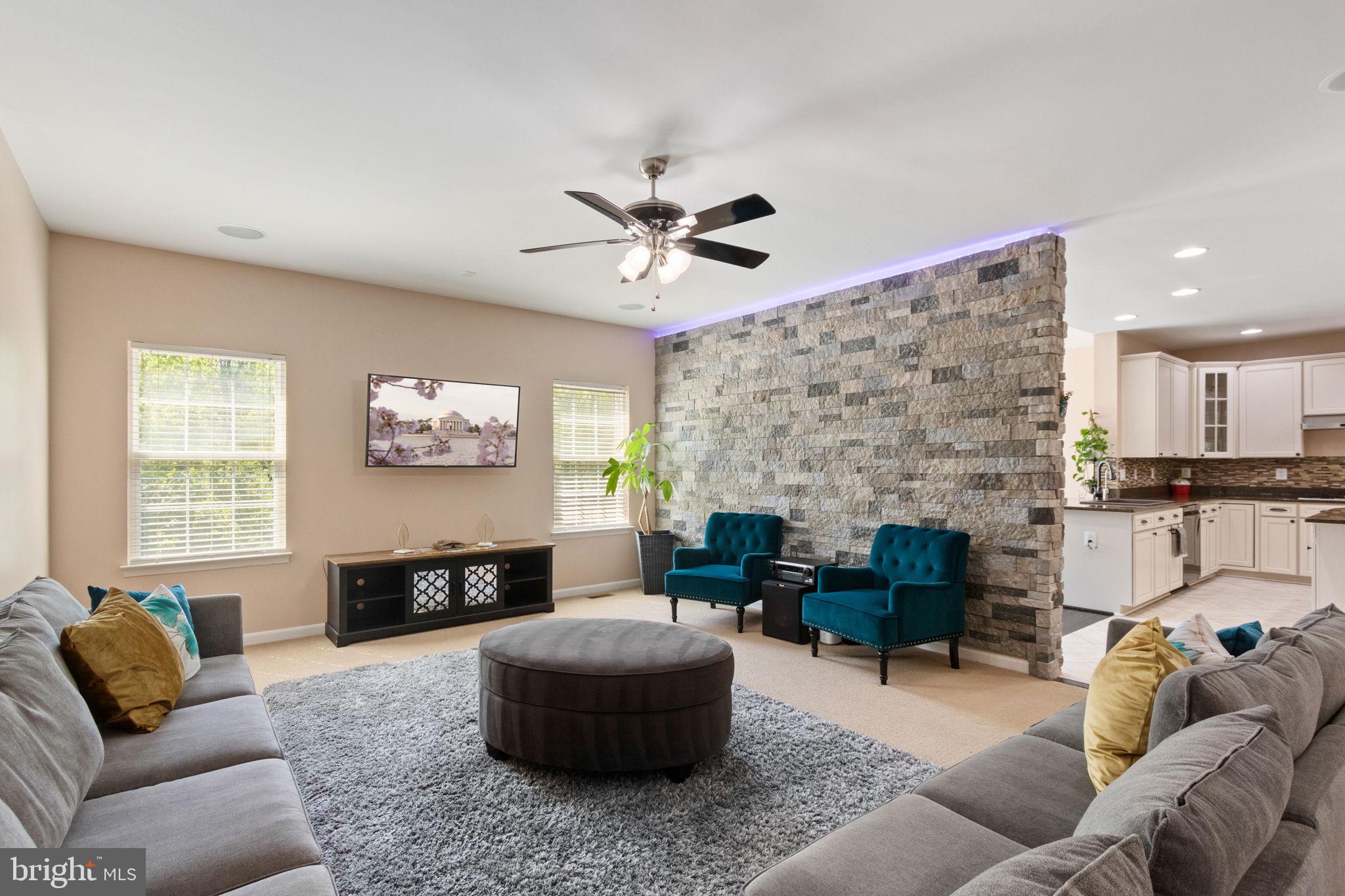 18 Dewitt Road Stafford, VA 22554 - Photo 20 of 73 a living room with furniture and a fireplace