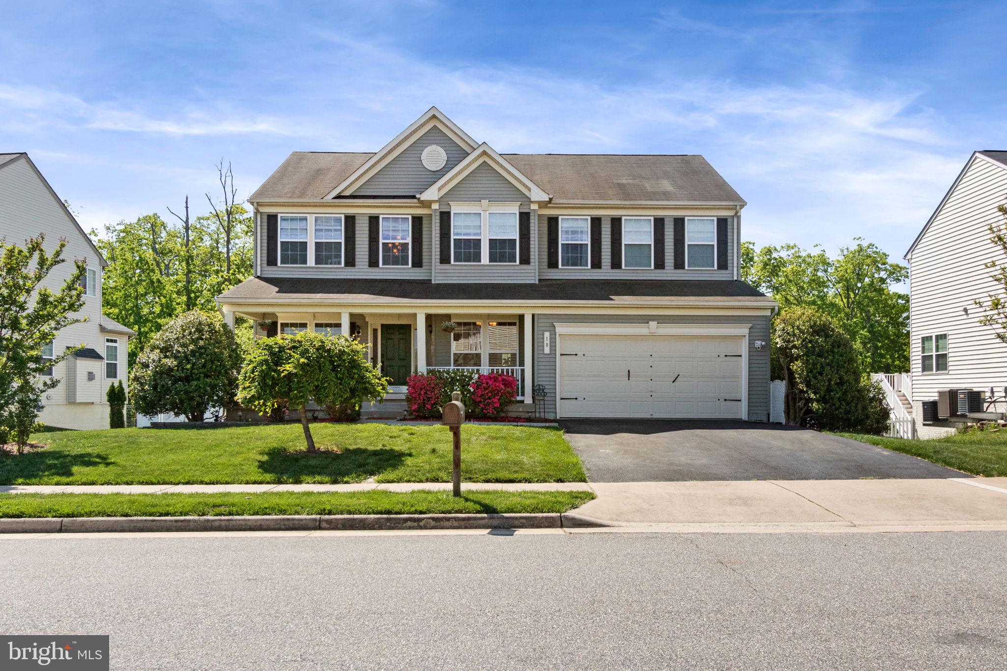 18 Dewitt Road Stafford, VA 22554 - Photo 2 of 73 a front view of a house with a yard