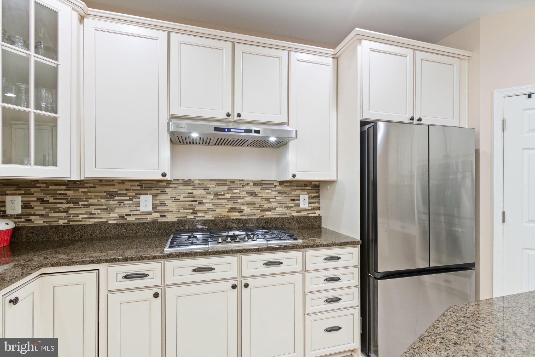 18 Dewitt Road Stafford, VA 22554 - Photo 24 of 73 a kitchen with appliances cabinets and a counter space