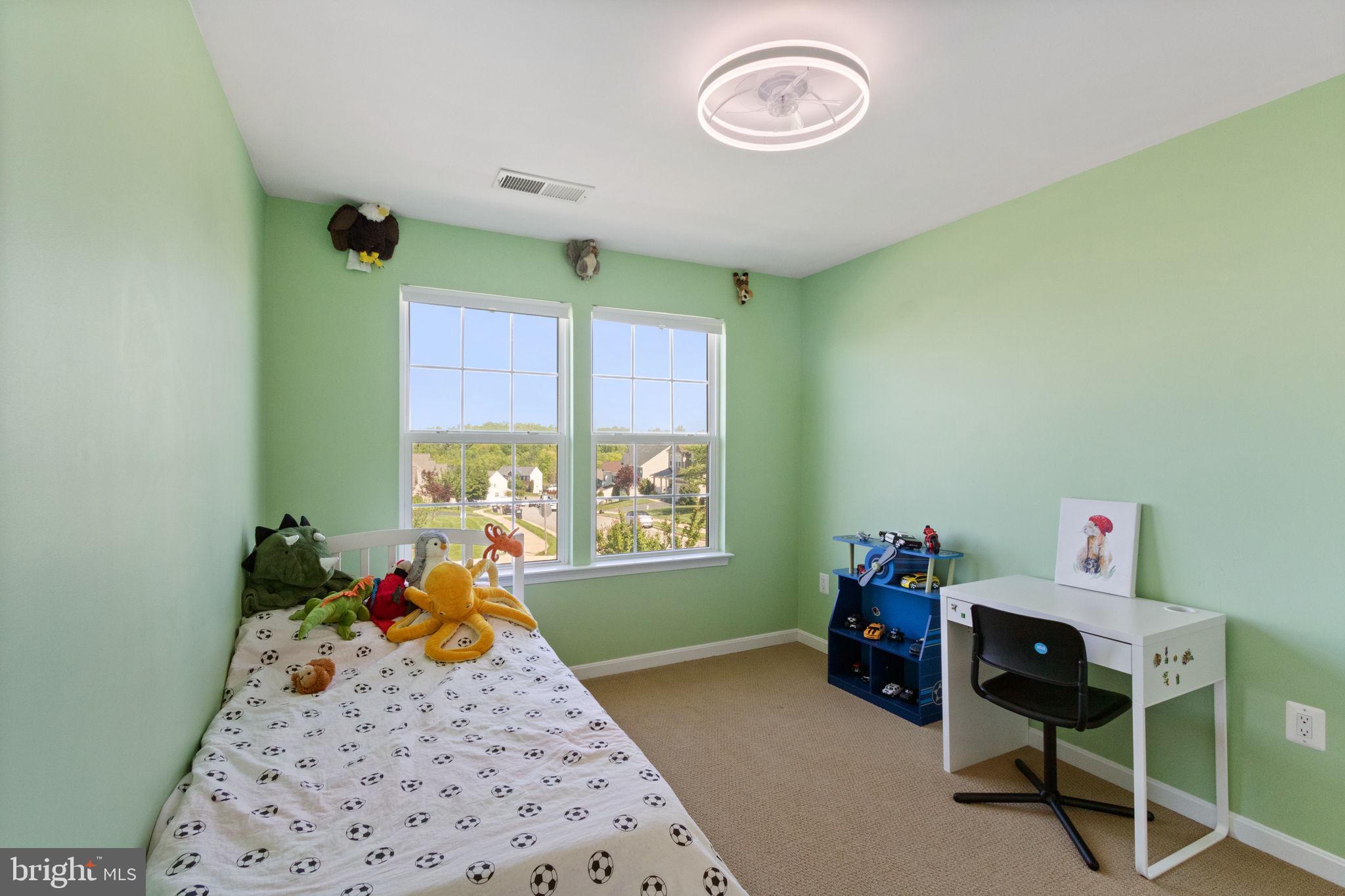 18 Dewitt Road Stafford, VA 22554 - Photo 29 of 73 a bedroom with a bed and a window
