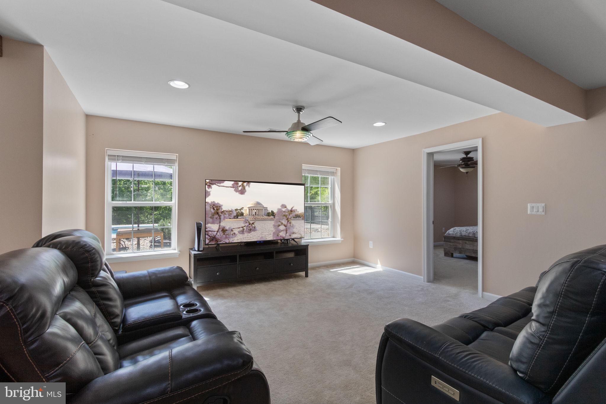 18 Dewitt Road Stafford, VA 22554 - Photo 51 of 73 a living room with furniture a window and a flat screen tv