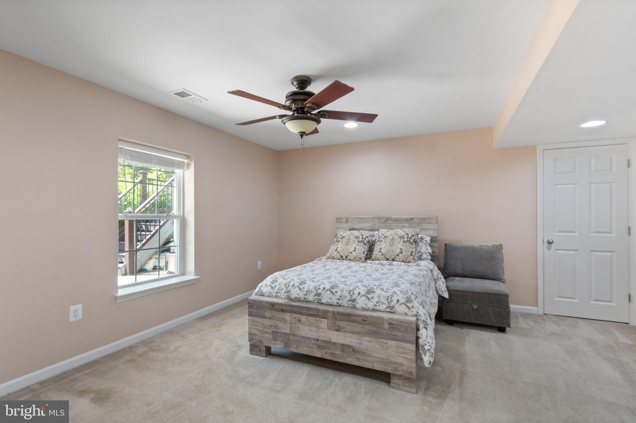 18 Dewitt Road Stafford, VA 22554 - Photo 56 of 73 a bedroom with a bed and a ceiling fan