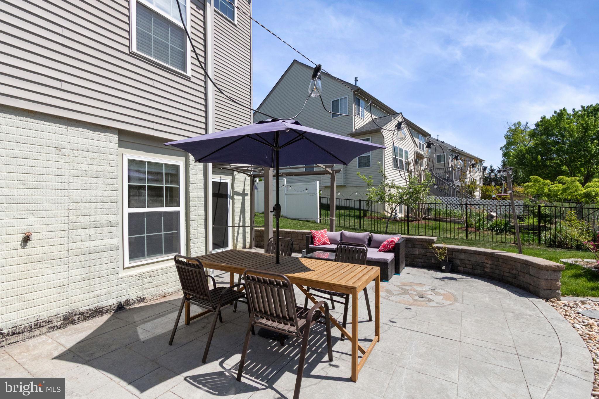 18 Dewitt Road Stafford, VA 22554 - Photo 62 of 73 a view of backyard with outdoor seating a patio and a garden