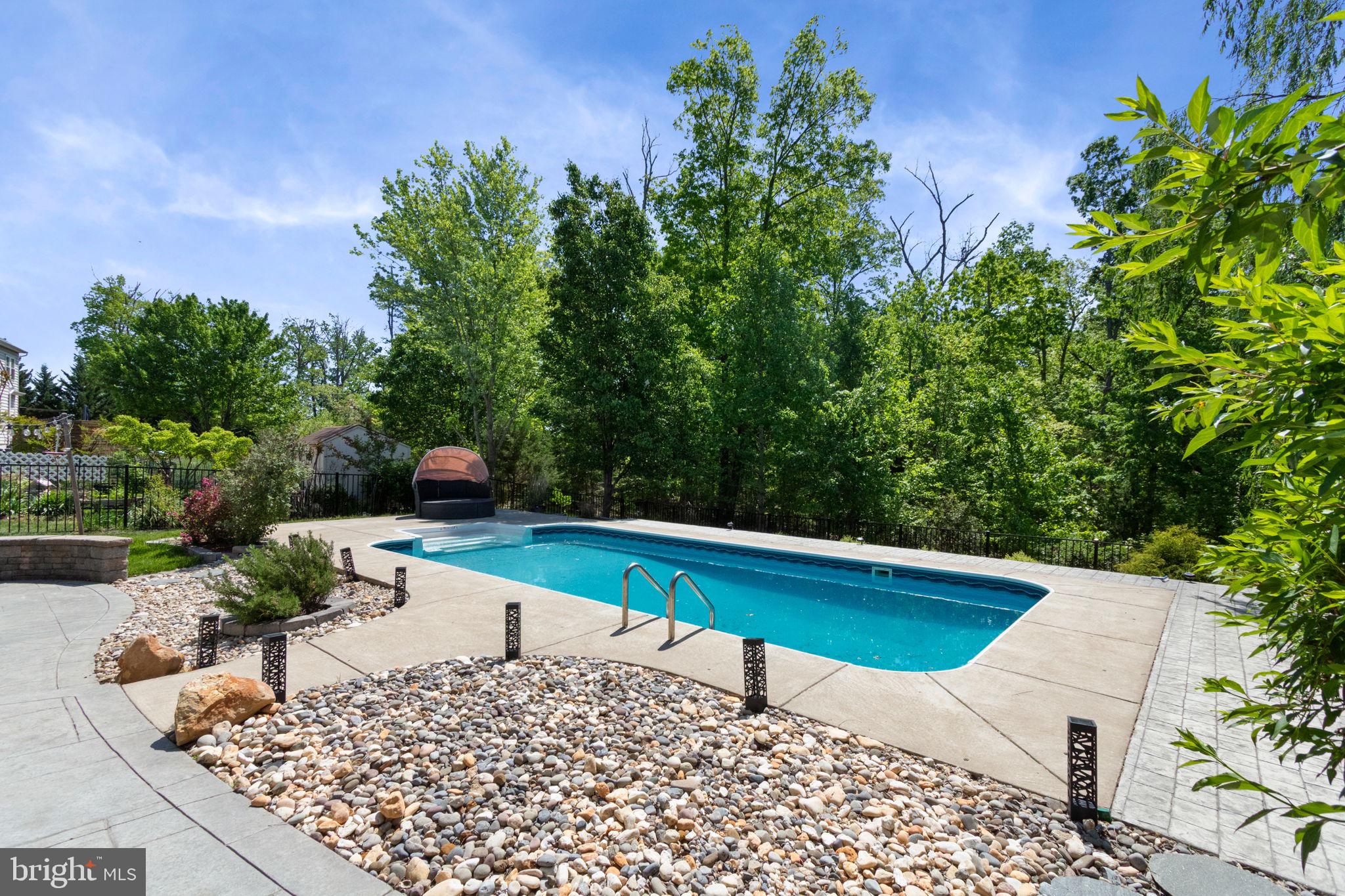 18 Dewitt Road Stafford, VA 22554 - Photo 67 of 73 a view of a backyard with plants and sitting area