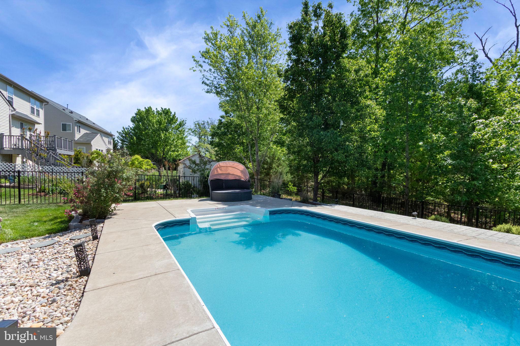 18 Dewitt Road Stafford, VA 22554 - Photo 69 of 73 a view of a swimming pool with a patio