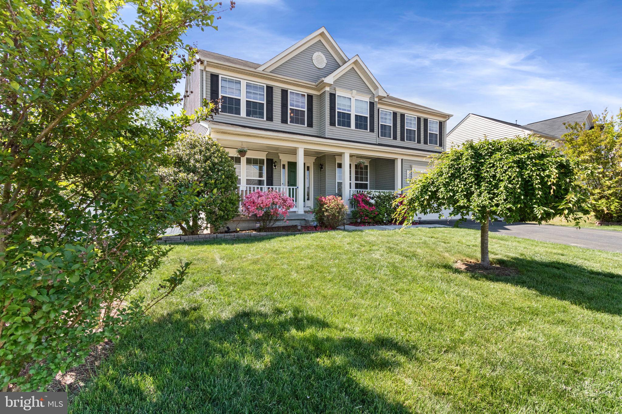 18 Dewitt Road Stafford, VA 22554 - Photo 8 of 73 a front view of a house with a yard