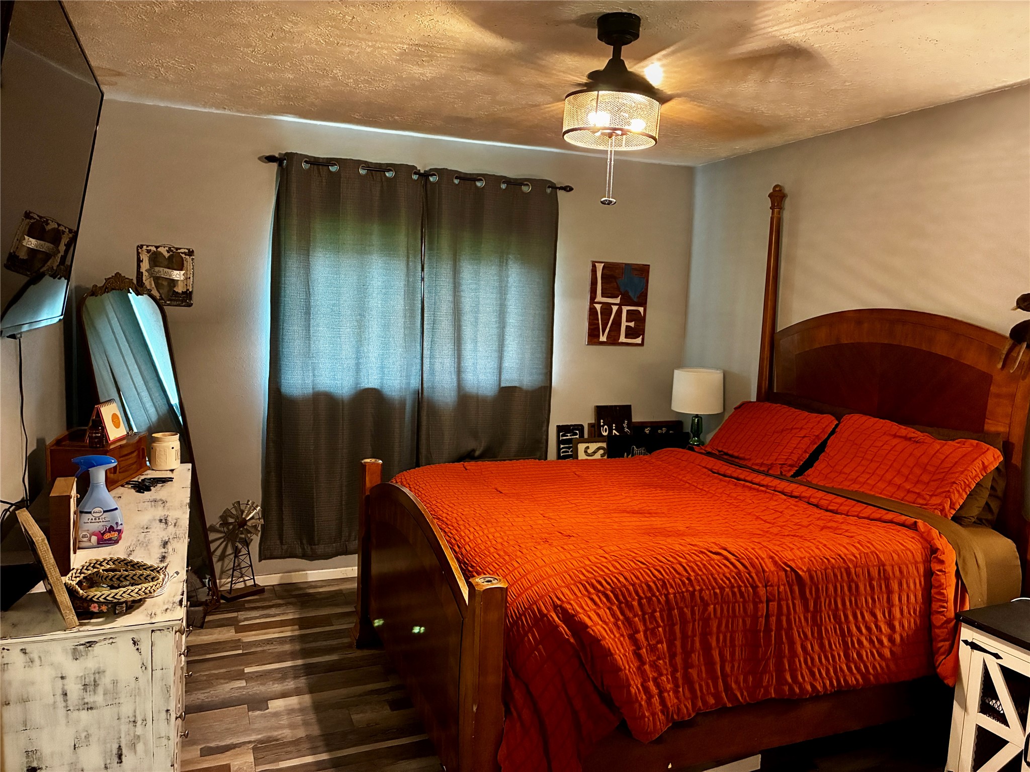 2 Sarita Road Angleton, TX 77515 - Photo 8 of 21 a bedroom with bed and a mirror