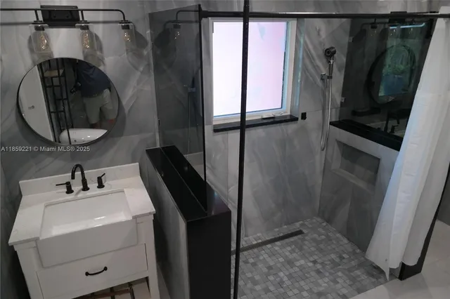 a bathroom with a sink and a toilet