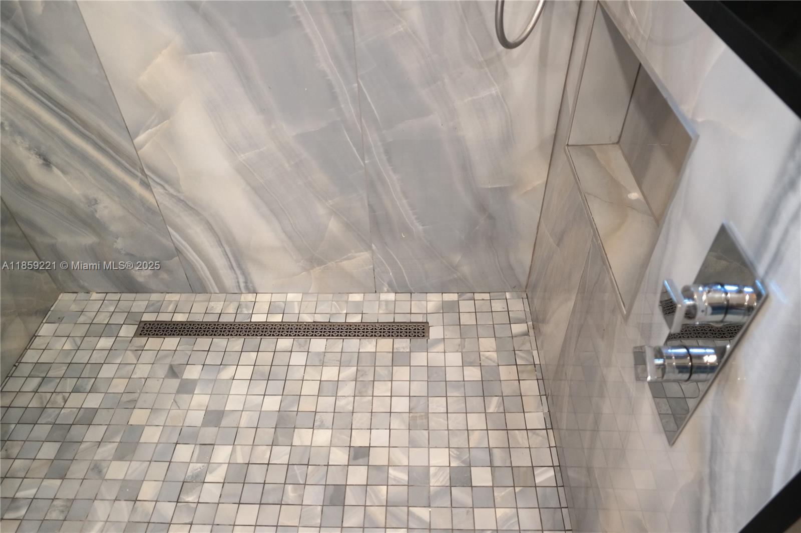 524 Northeast 27th Drive Wilton Manors, FL 33334 - Photo 19 of 95 a bathroom with a shower