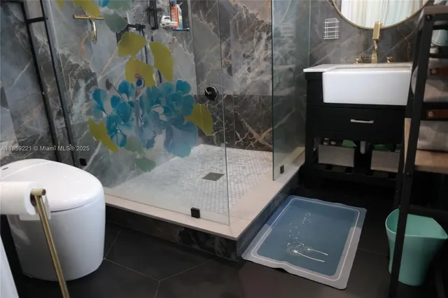 a front view of a house with an outdoor seating space