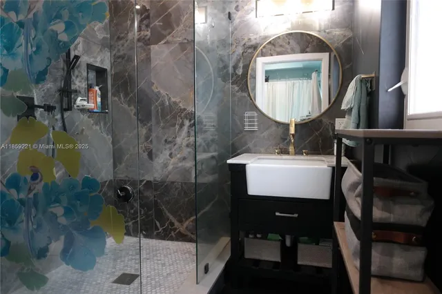 a vase of flowers sitting on a table in front of a house