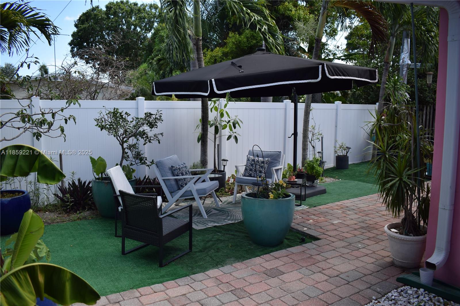 524 Northeast 27th Drive Wilton Manors, FL 33334 - Photo 40 of 95 a view of outdoor space yard and patio