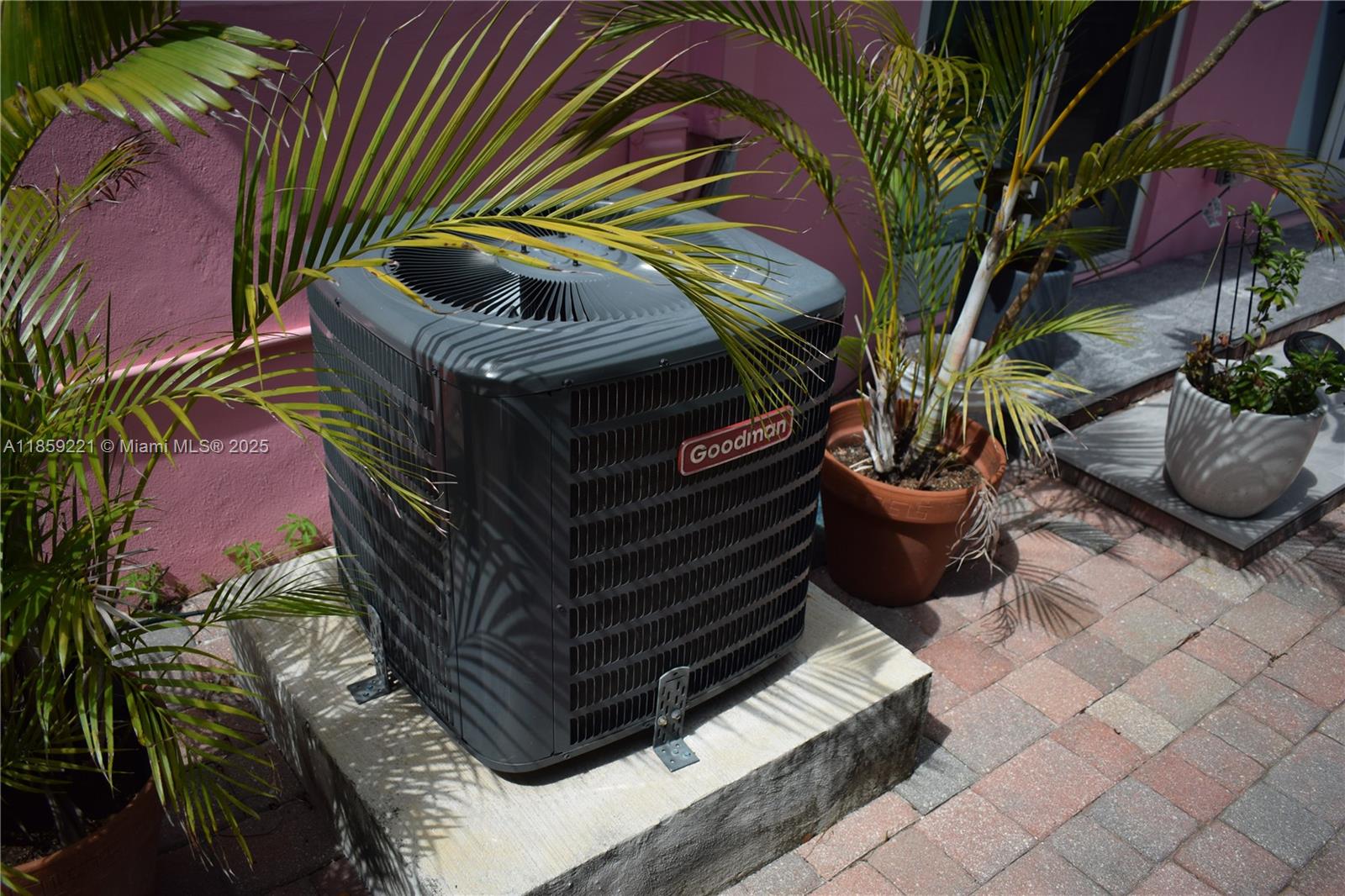 524 Northeast 27th Drive Wilton Manors, FL 33334 - Photo 50 of 95 Second A/C unit positioned on opposite side of the home, ensures enhanced cooling and energy efficiency throughout