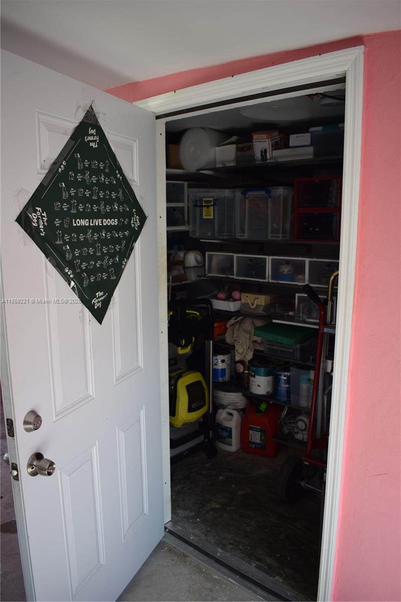 524 Northeast 27th Drive Wilton Manors, FL 33334 - Photo 60 of 95 Includes extra storage space for added convenience and organization, just across from carport.