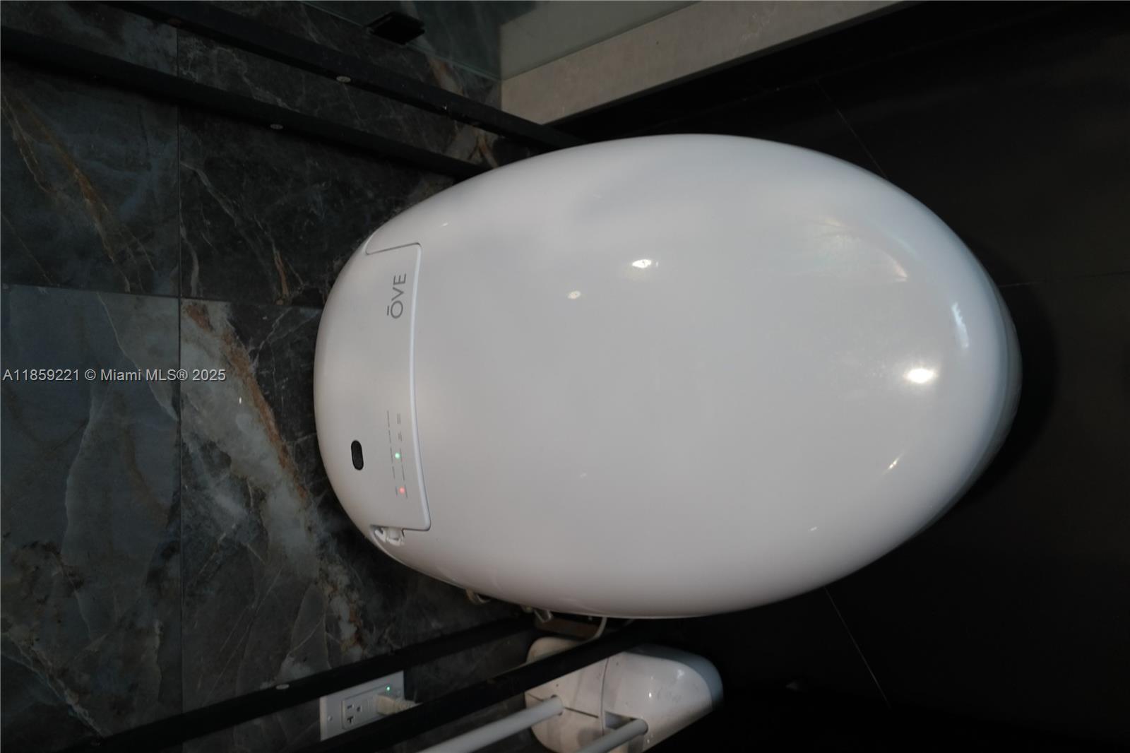 524 Northeast 27th Drive Wilton Manors, FL 33334 - Photo 69 of 95 Experience luxury with a fully controlled smart toilet offering personalized settings and advanced functionality