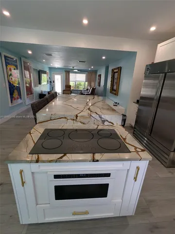 a view of a livingroom with furniture and window