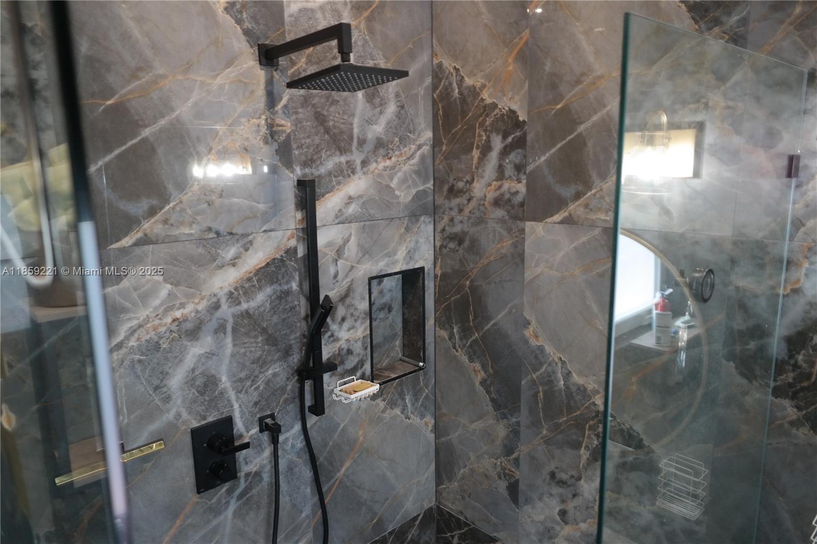 524 Northeast 27th Drive Wilton Manors, FL 33334 - Photo 71 of 95 Functional enhancements throughout the bathroom create a serene, spa-inspired atmosphere for daily rejuvenation