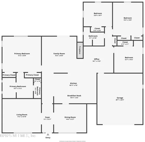 an aerial view of a house with a yard and garden