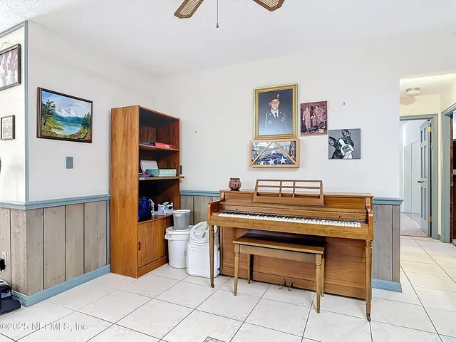 a view of a livingroom with furniture and a couch