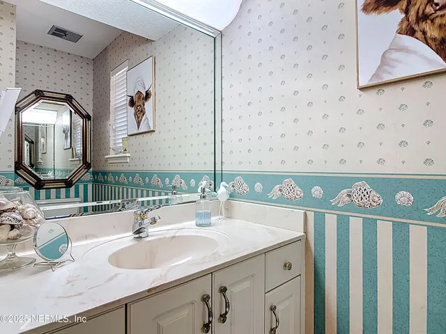 an entryway with a flower pot