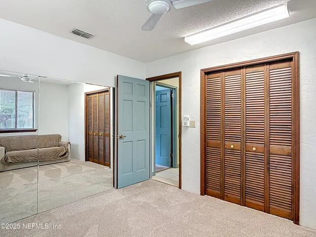 a living room with furniture and window
