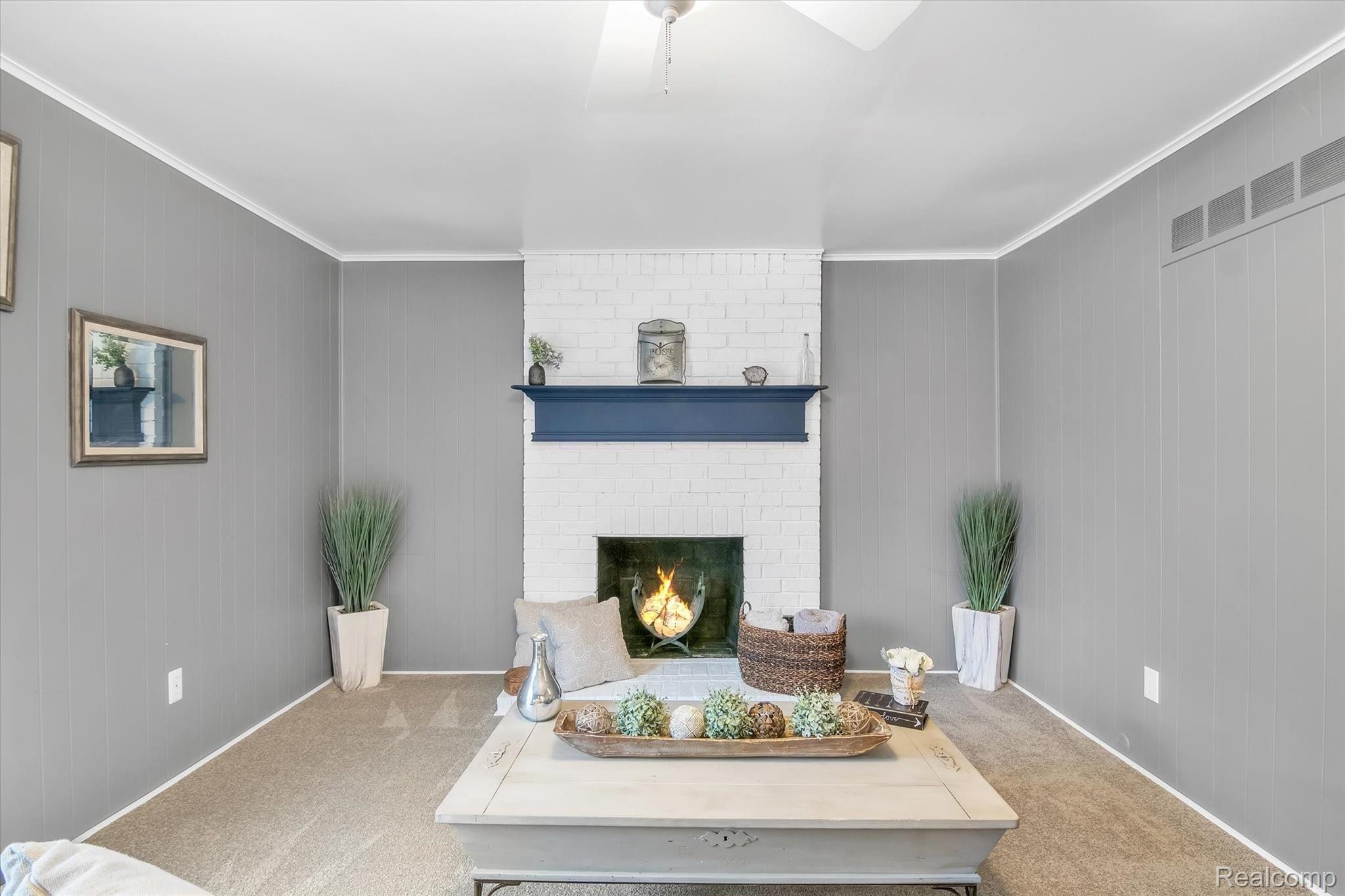 6344 Raintree Drive Canton, MI 48187 - Photo 16 of 38 Natural wood fireplace and brand new carpet