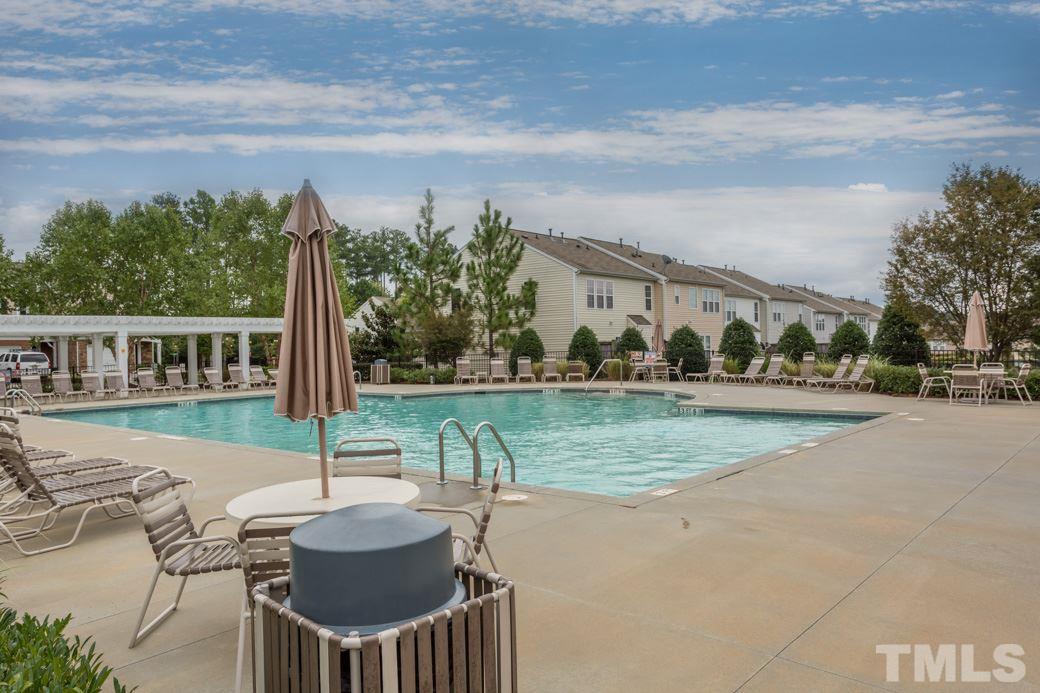 8610 Redcrest Place Raleigh, NC 27617 - Photo 27 of 30 a view of a patio with swimming pool
