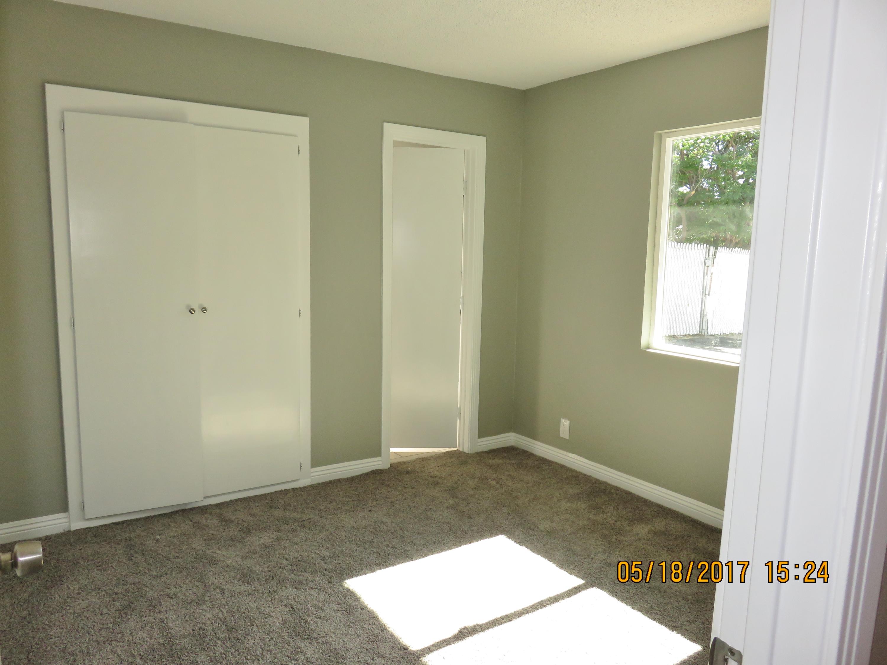 45402 Raysack Avenue Lancaster, CA 93535 - Photo 11 of 15 an empty room with a window