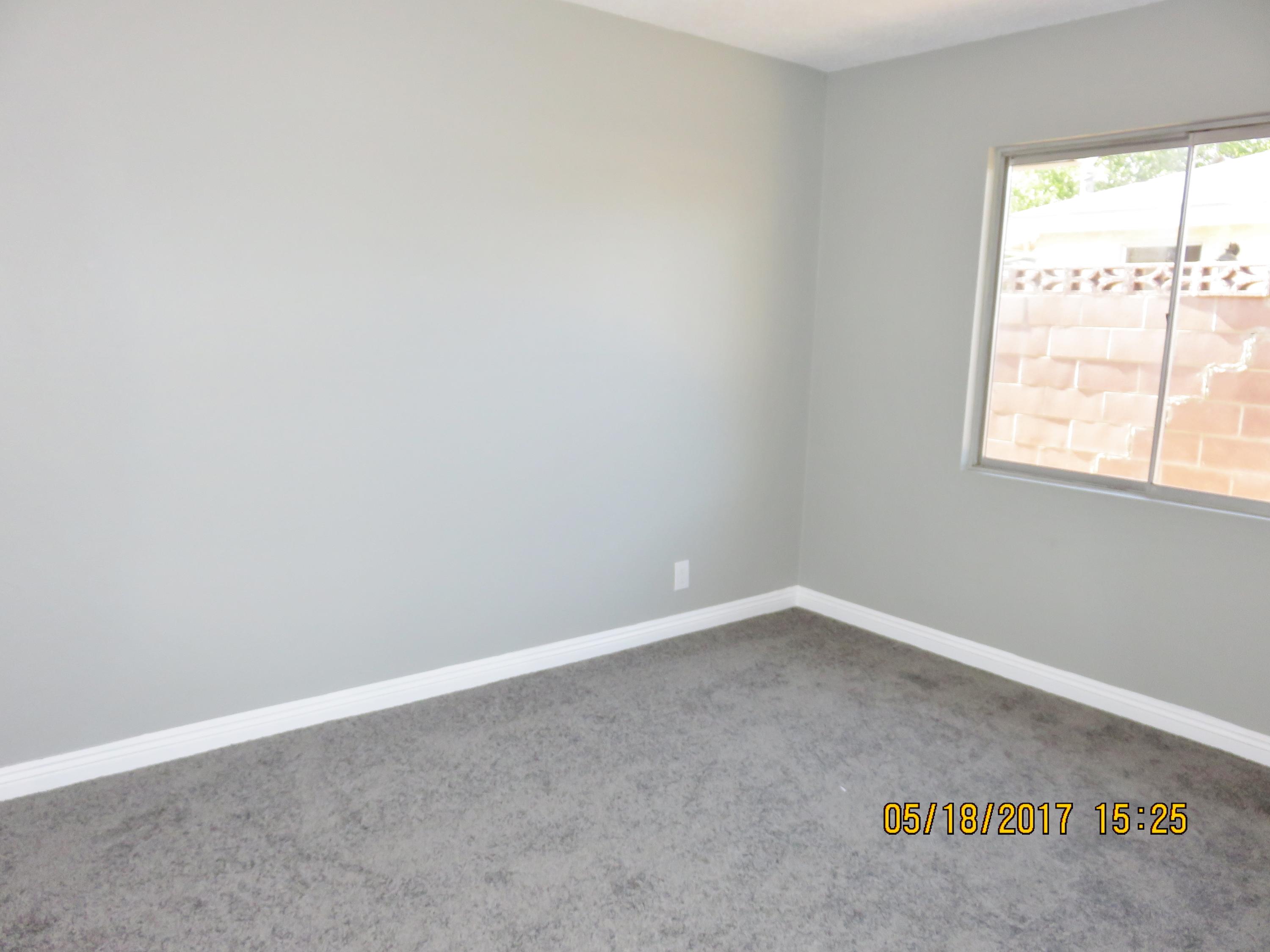 45402 Raysack Avenue Lancaster, CA 93535 - Photo 12 of 15 an empty room with a window