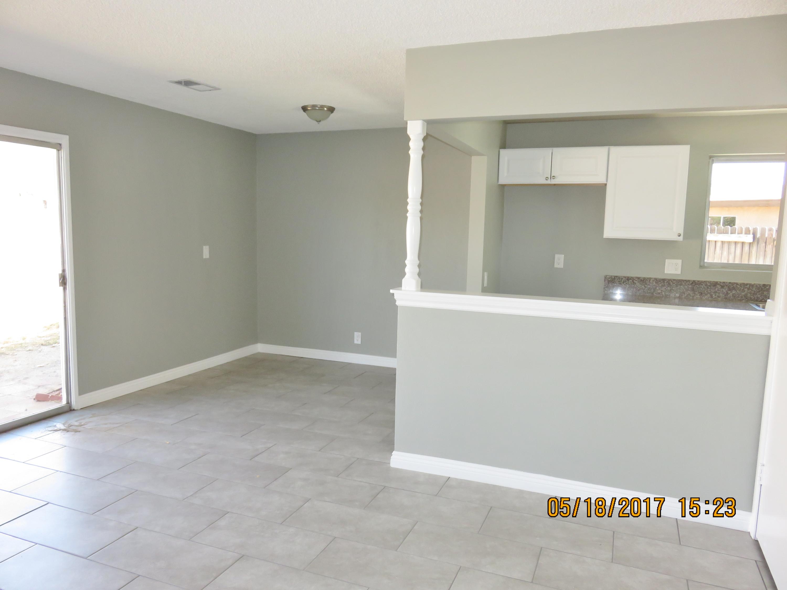 45402 Raysack Avenue Lancaster, CA 93535 - Photo 7 of 15 a view of a kitchen cabinets