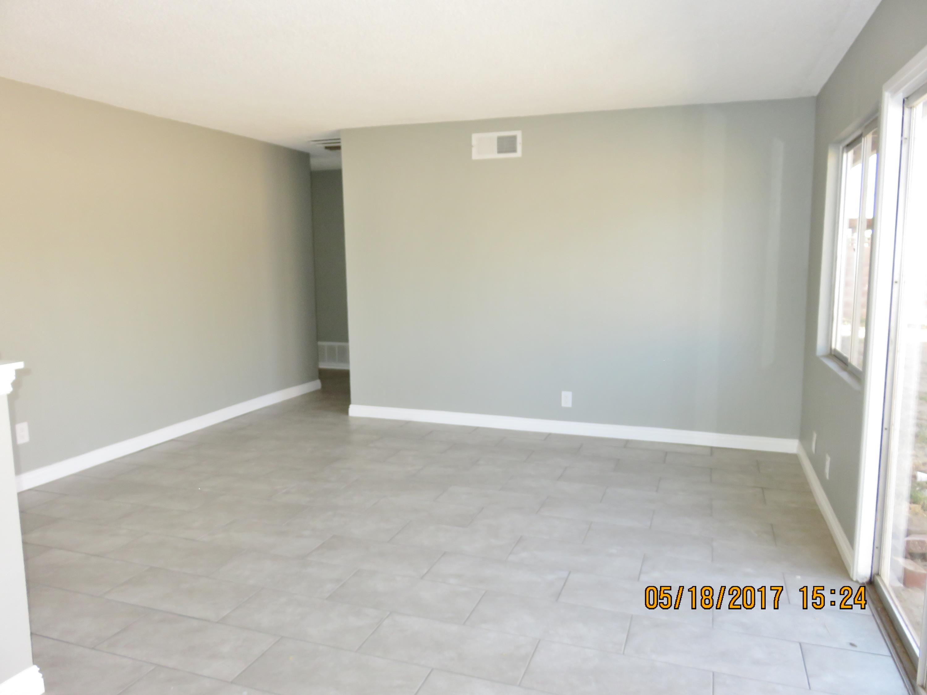 45402 Raysack Avenue Lancaster, CA 93535 - Photo 8 of 15 an empty room with windows