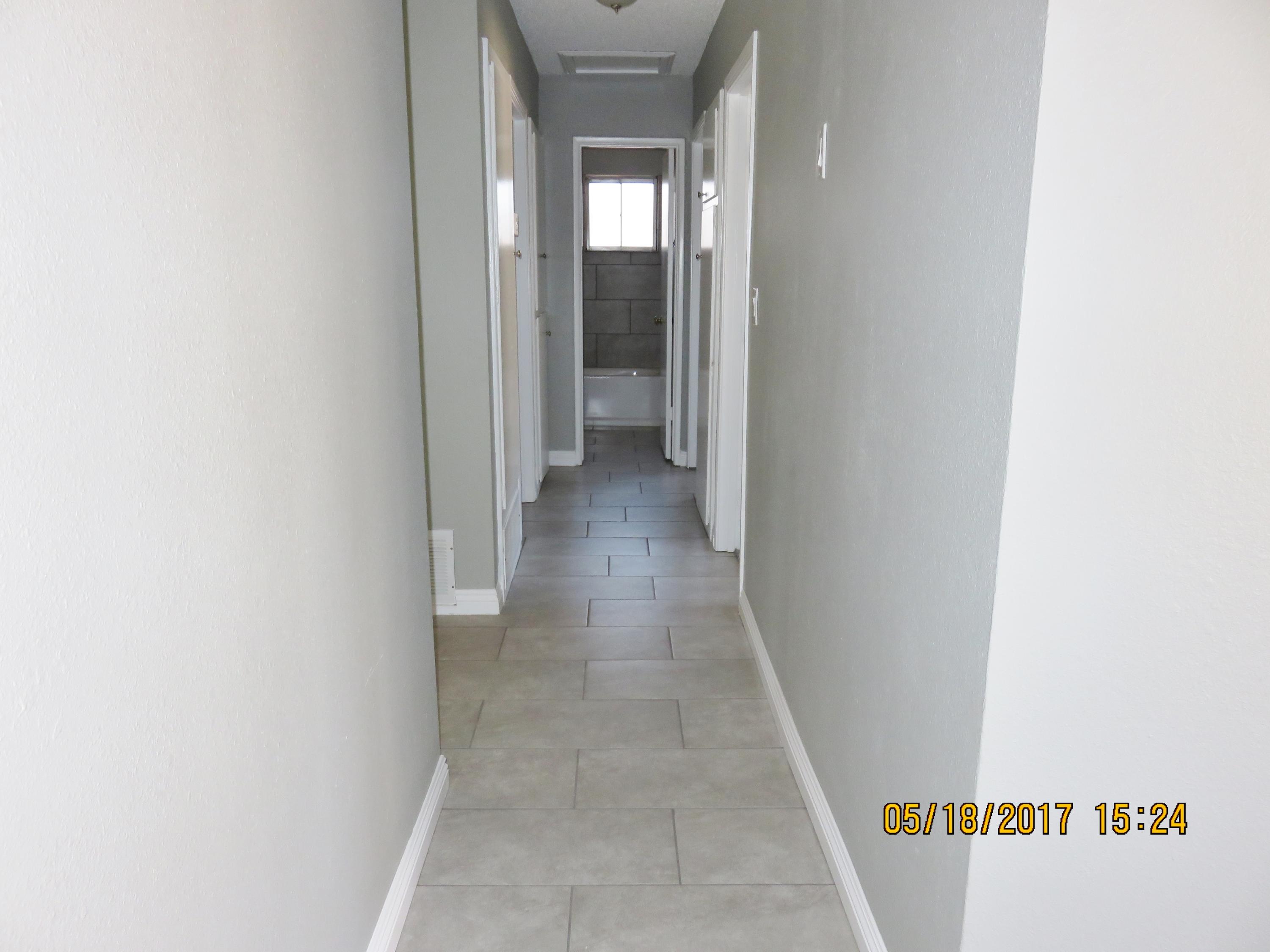 45402 Raysack Avenue Lancaster, CA 93535 - Photo 9 of 15 a view of a hallway